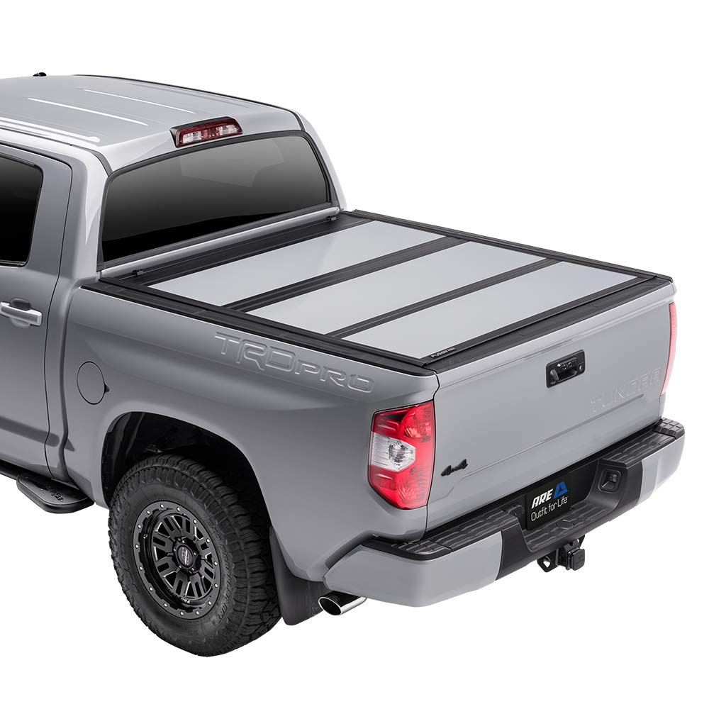 A.R.E. Fusion Painted Hard Fold Truck Bed Tonneau Cover | Ar32006L-Ps2 | Fits 2009 - 2018 Dodge Ram W/O Rambox 5' 7' Bed (67'), Paint Code: Ps2 Bright Silver