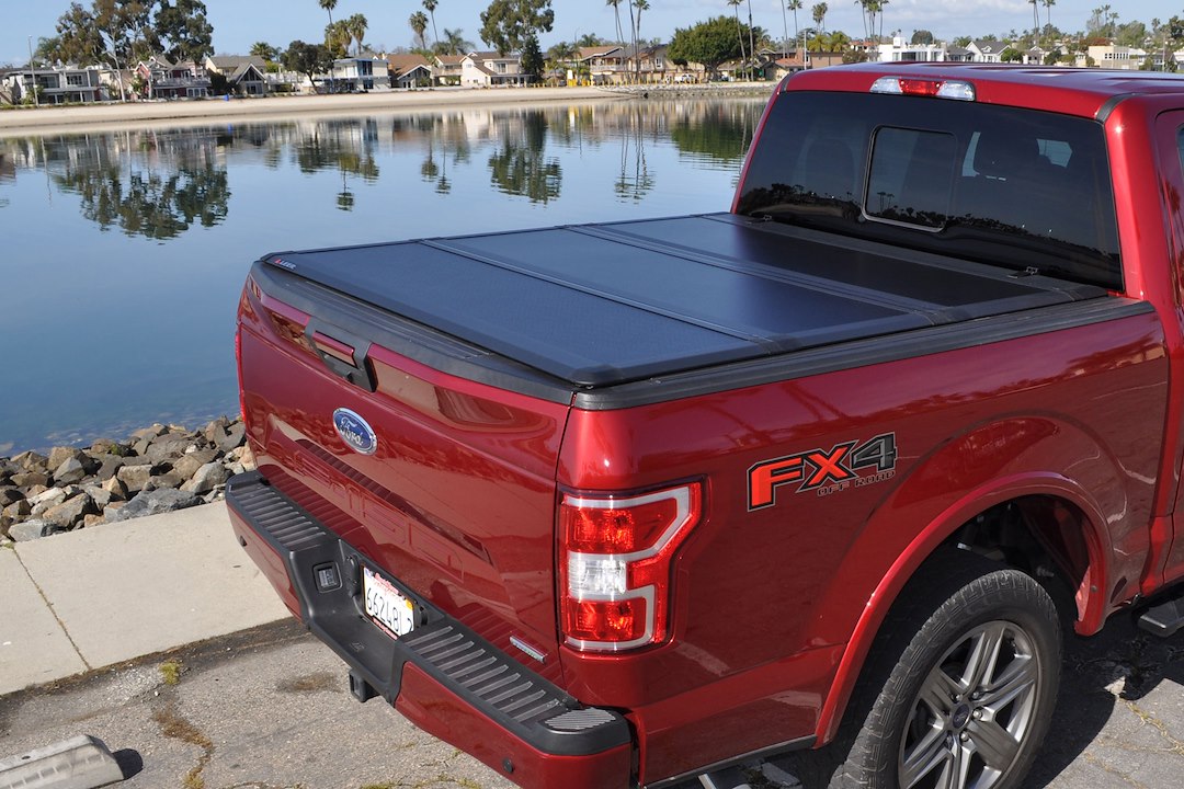 Leer Hf350M Tri-Folding Truck Bed Tonneau Cover, Fits Chevy Silverado And Gmc Sierra 1500 Crew Cab, Years 2019-2024, 5'8' Truck Bed, Black